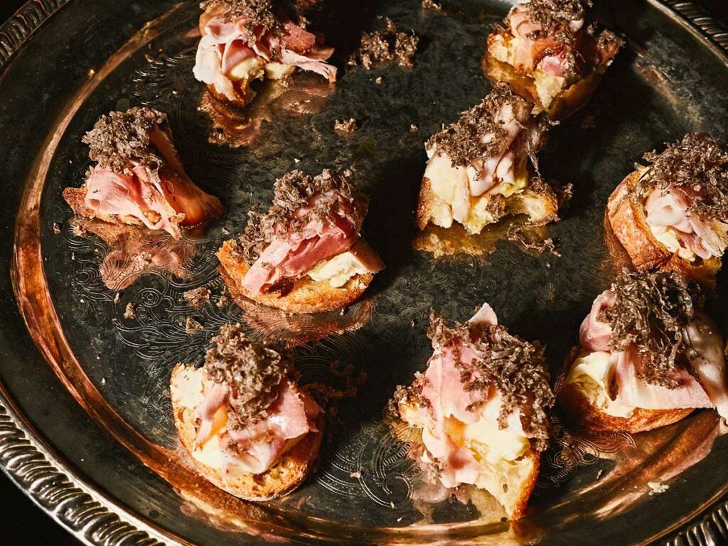 Jamon, butter, and shaved black truffles on toast