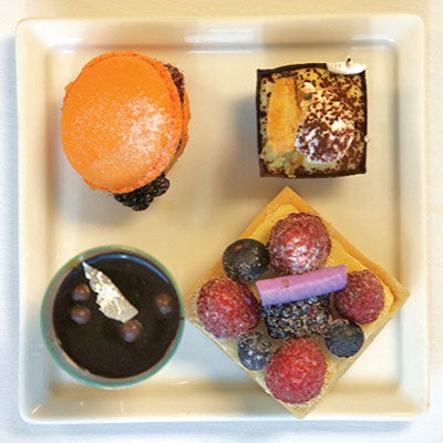 Mango-passion fruit _macaron_; tiramisu mousse; berry cheesecake; mango and chocolate pots de creme