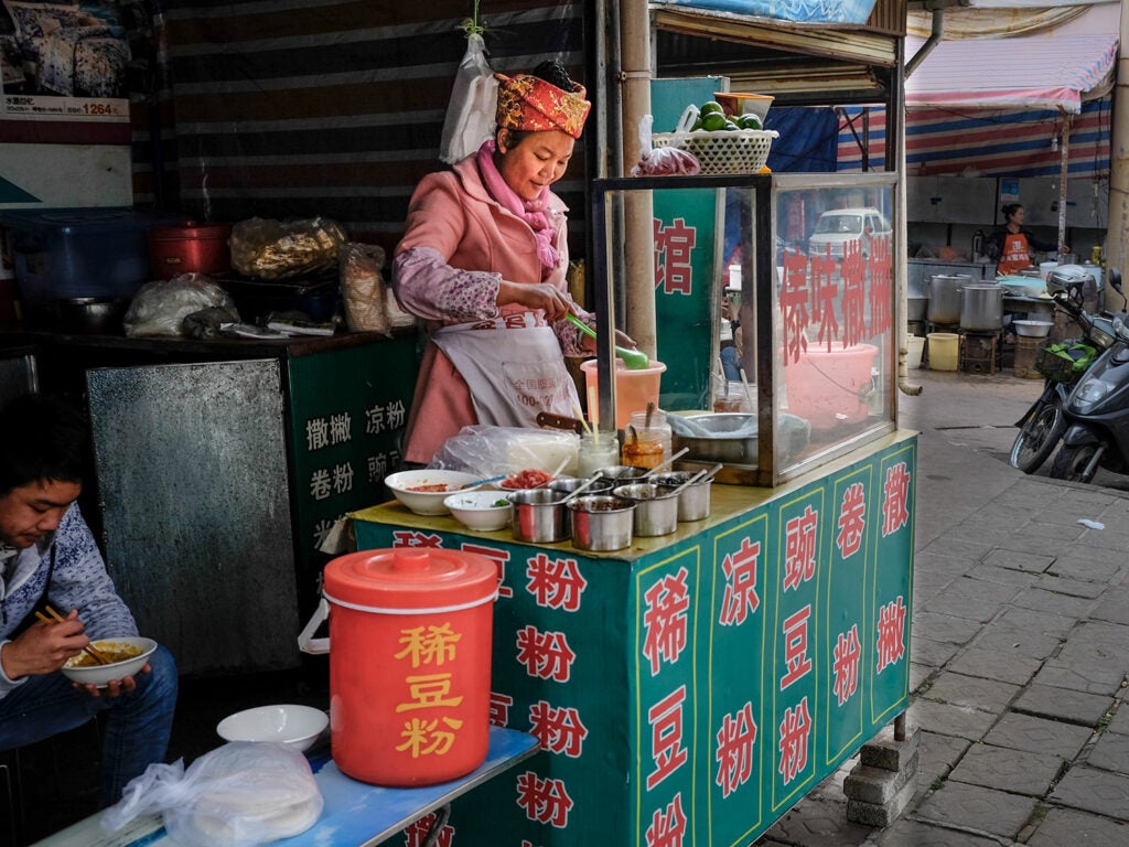 A snack vendor in Tengchong China