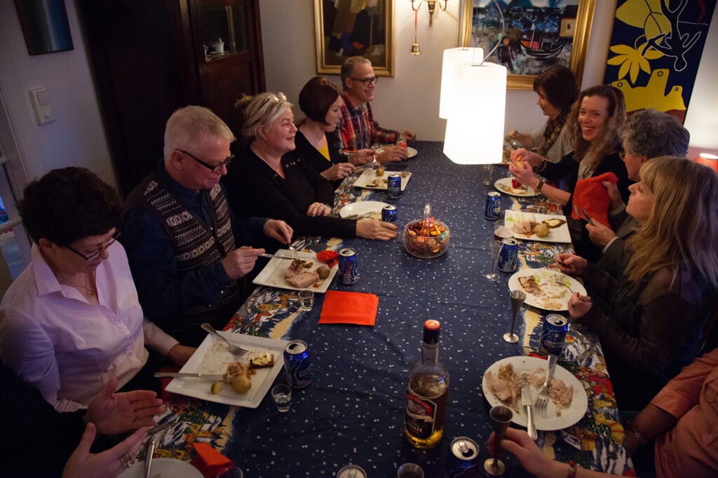A family eats a holiday meal in Iceland