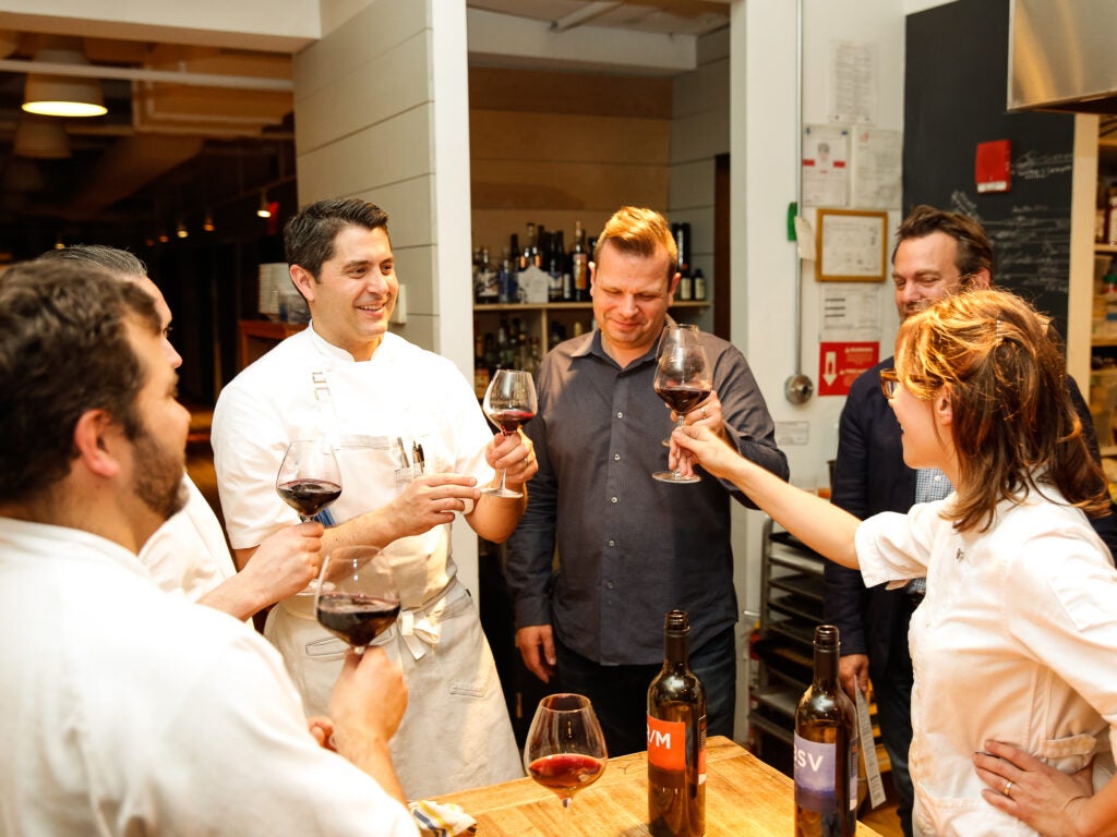The chefs toast to Amy's successful supper