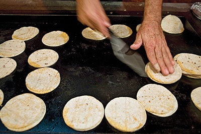Grilling tortillas in East LA
