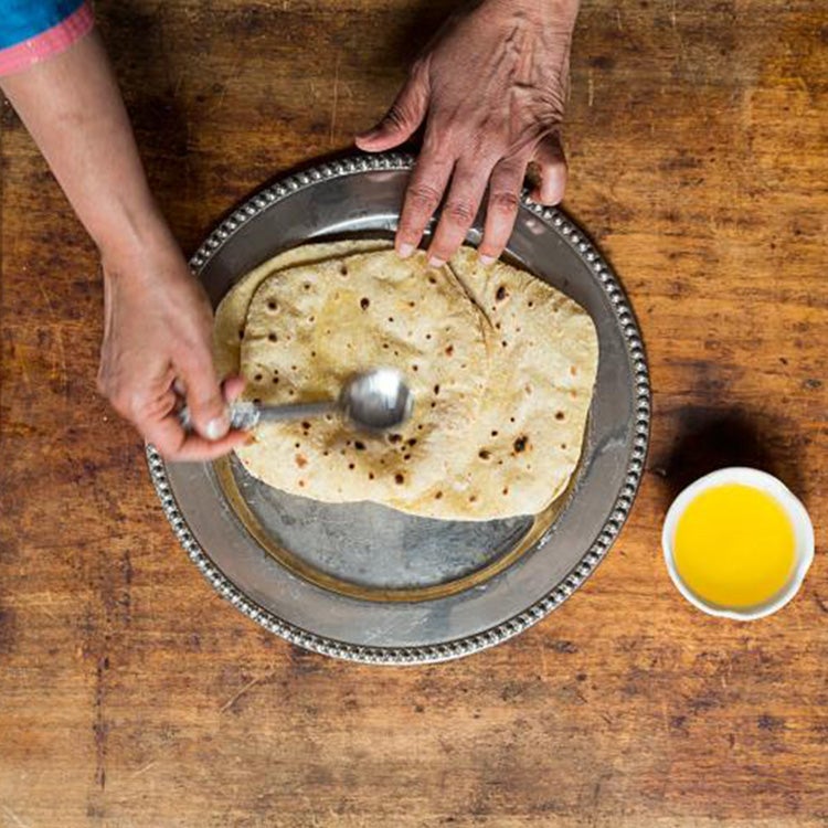 httpswww.saveur.comsitessaveur.comfilesimport20142014-08gallery_india-chapati-how-to-ghee_750x750.jpg