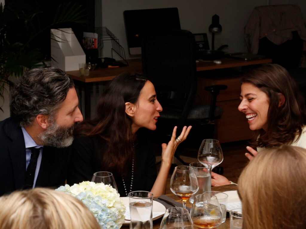 Christophe and Nefissa Attard of Air France share a laugh with SAVEUR Test Kitchen Director Stacy Adimando.