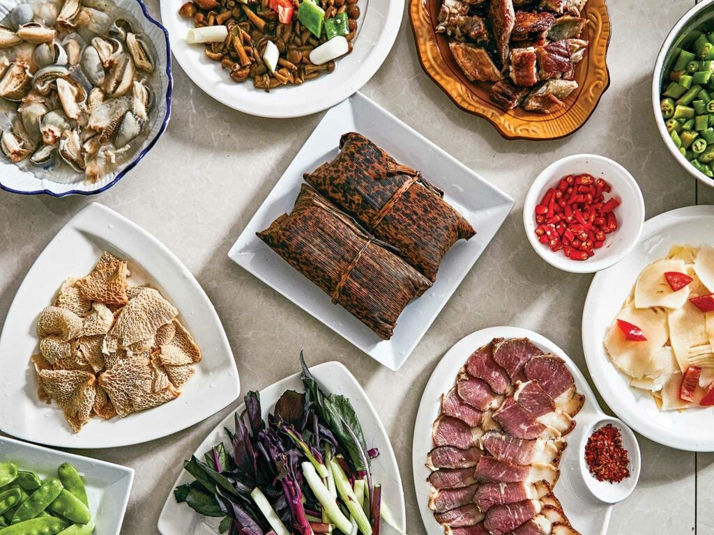 An array of dishes at Qicai Shanzhuang restaurant