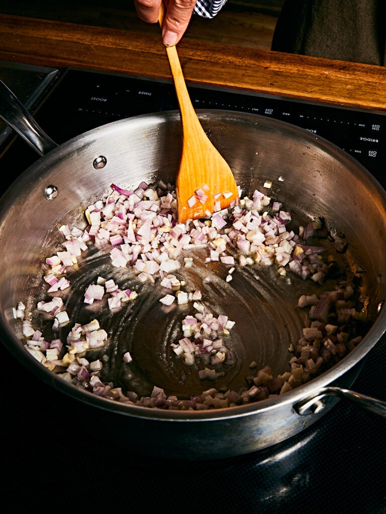 Shallots and garlic sautéed  in butter to make an aromatic base for your risotto.