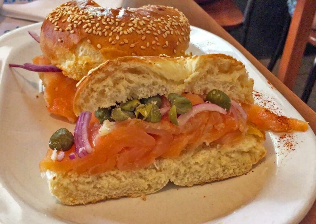 A sesame bagel with lox and cream cheese at La Crespo in Buenos Aires.