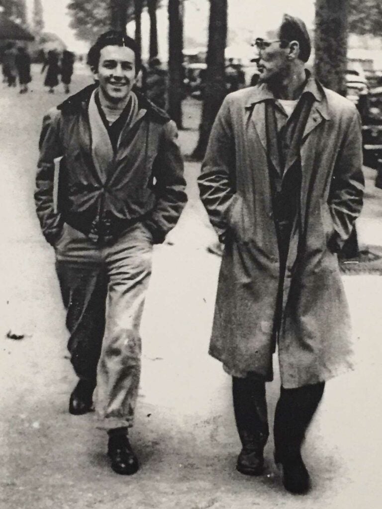 Mitchell walks the Boulevard de Montparnasse with his friend, character actor Frank Billerbeck.