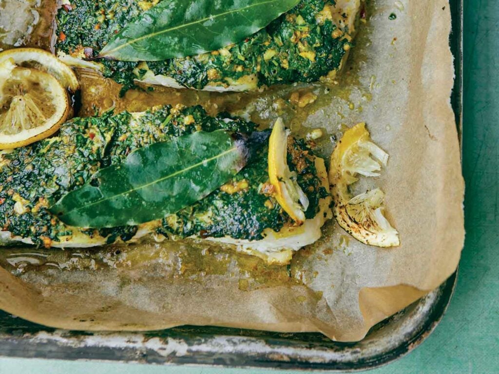 Roasted cod with a cilantro crust (Samak mashew bil cozbara w al limon)